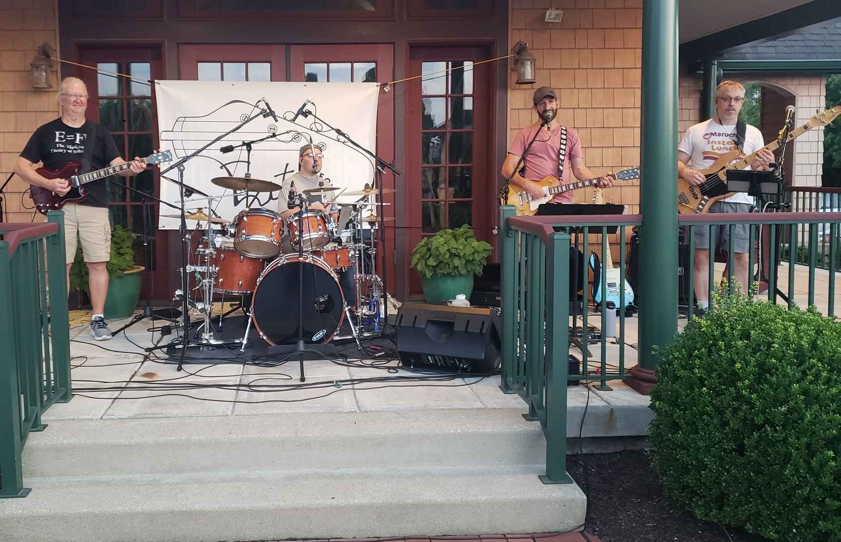 Exit Strategy performing on a front porch